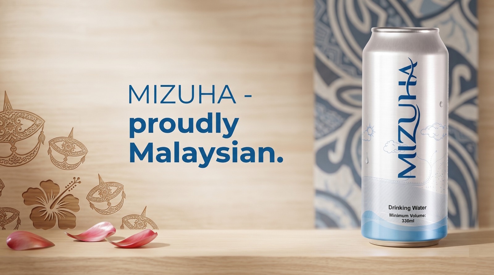 MIZUHA 330ml can on a wooden surface with Malaysian batik motif and hibiscus — proudly Malaysian